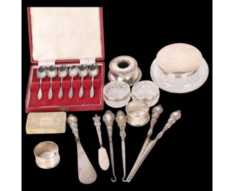 Various silver, including dressing table powder jar, candlestick holder, napkin rings, etc . Condition Report: Lot sold as se