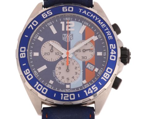 TAG HEUER - a stainless steel Formula 1 Gulf quartz chronograph calendar wristwatch, ref. CAZ101N, deep blue dial with light 