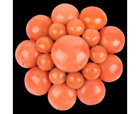An Antique button coral flowerhead cluster brooch, unmarked, 27.4mm, 7.9g . Condition Report: All stones present, most are sl