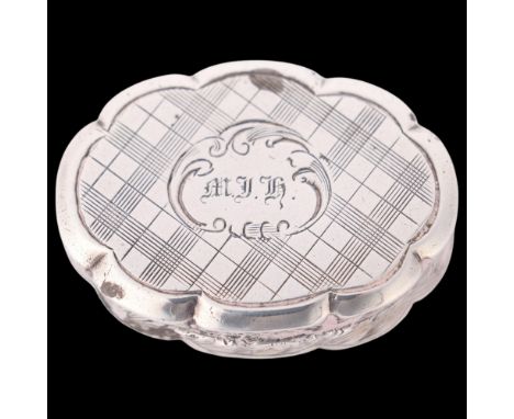 An early Victorian silver vinaigrette, William & Edward Turnpenny, Birmingham 1846, oval form with allover engine turned deco