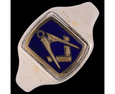 A silver-gilt enamel Masonic signet ring, maker JHW, Birmingham 1989, setting height 7.4mm, size V, 6g . Condition Report: No