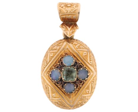 An Antique Victorian 9ct gold chrysolite and opal mourning locket pendant, oval form with chased scrollwork decoration, match