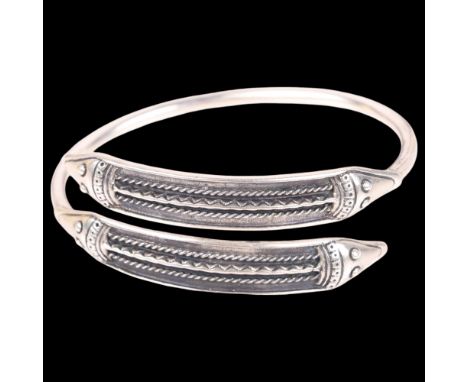 JENS JOHS AAGAARD - a Danish sterling silver Viking Revival torque bangle, setting height 23.7mm, internal circumference 18cm