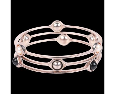 GEORG JENSEN - a set of 3 Danish modernist sterling silver 'Sphere' bangles, model no. 473M, set with onyx and pearl, individ