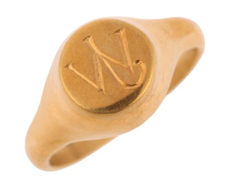 An 18ct gold signet ring, unmarked mount tests as 18ct, setting height 8.8mm, size P, 11.4g . Condition Report: No damage or 