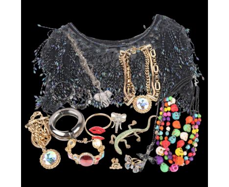 A quantity of Butler & Wilson costume jewellery, including skull bead necklace, lizard brooch, cross pendant necklace, etc . 