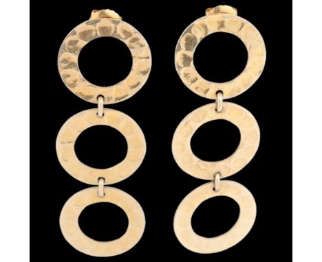 STEEN F BAKER - a pair of Danish sterling silver-gilt hoop drop stud earrings, with planished decoration, 57.3mm, 7.4g . Cond