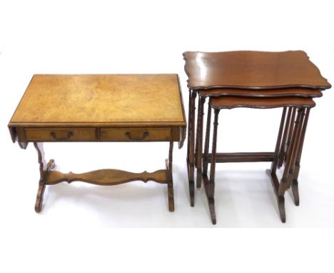 A reproduction Regency style mahogany and walnut miniature sofa table with two drawers, 69cm wide and a nest of there reprodu