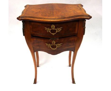 A reproduction Louis XV style walnut kingwood gilt metal mounted petit bombe commode, with two drawers, on cabriole legs, 48c