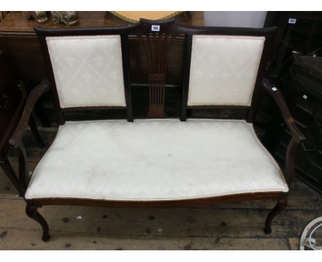 A Victorian mahogany two seat salon sofa, 107cm wide.