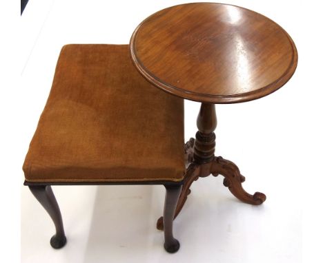 A Victorian walnut pedestal table, the circular top on a turned column and tripod base, 72cm high and a 20th century mahogany