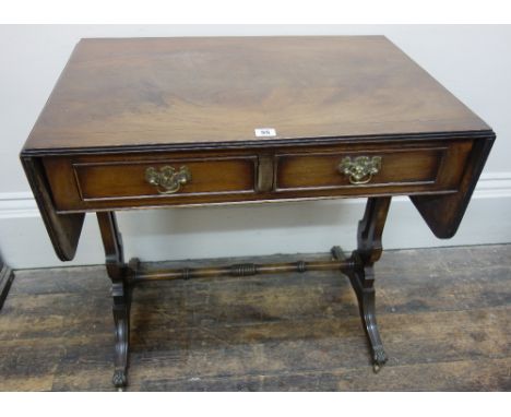 A reproduction Regency style mahogany and banded sofa table, 75cm wide