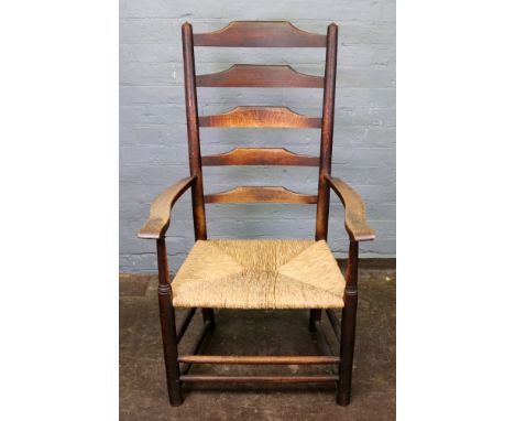 An oak ladder back rush seated elbow chair, 19th century, an Edwardian inlaid mahogany and rosewood corner chair and a set of