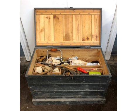 A wooden tool box, 75cm wide x 44cm deep x 48cm high containing carpentry and general tools (qty).