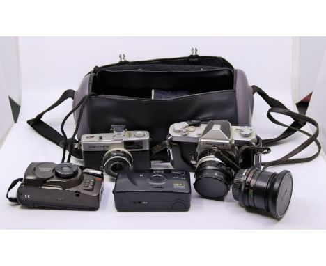 A Nikomat FT 4457028 camera in case, Olympus Trip 35 camera and quantity of other cameras and lens etc, in two carrying case,