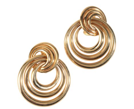 CARTIER: A PAIR OF VINTAGE EARRINGSin 18ct gold, each comprising graduated interlinking concentric hoops, secured with post a