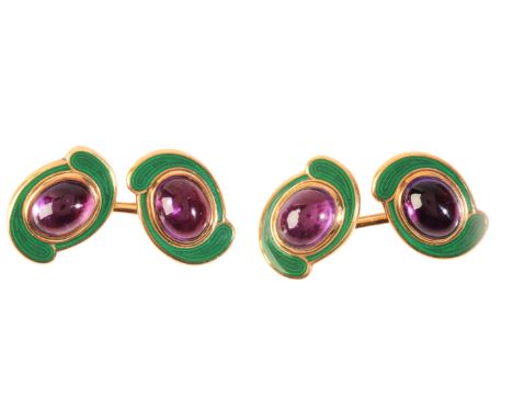 DEAKIN & FRANCIS: A PAIR OF AMETHYST AND GREEN ENAMEL CUFFLINKSin 18ct gold, each oval terminal set with an amethyst cabochon