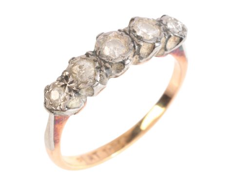 A DIAMOND FIVE STONE RINGin 18ct gold and platinum, set with five graduating old mine cut diamonds, stamped 'PLAT 18CT', size