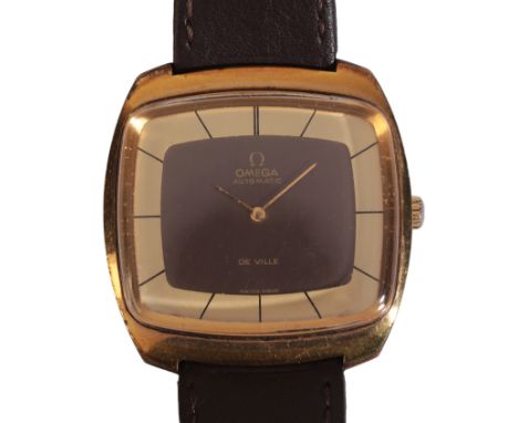 OMEGA DE VILLE: A GENTLEMAN'S GOLD-PLATED WRISTWATCHwith manual wind movement, the two-tone gold and brown dial with black ba