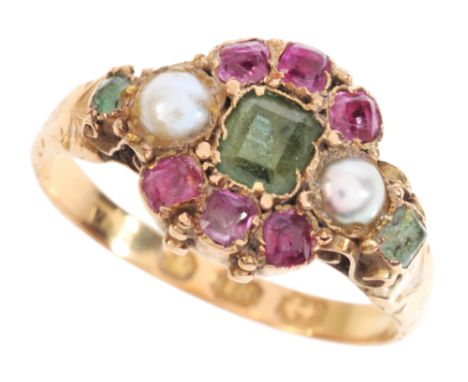 AN ANTIQUE GEM-SET CLUSTER RINGin 18ct gold, set with a step cut emerald, surrounded by a cluster of cushion cut rubies, to s