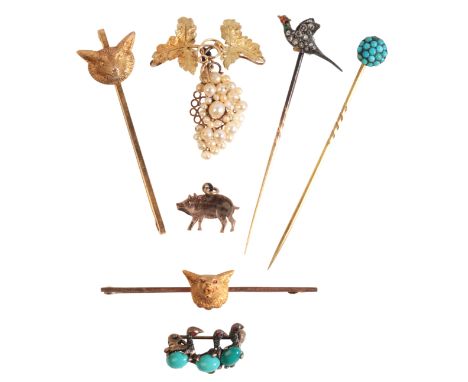 A COLLECTION OF ANTIQUE STICK PINS AND BROOCHESincluding two fox head bar brooches in 9ct and 15ct gold; a diamond pheasant s