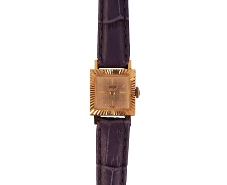 TUDOR: A LADY'S 18CT GOLD WRISTWATCHwith manual wind movement, the square gold dial with gold baton numerals and gold hands, 