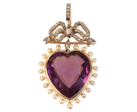 AN ANTIQUE AMETHYST AND DIAMOND HEART AND BOW PENDANT / BROOCHin silver on gold, set with a heart shape amethyst of c.21.83 c