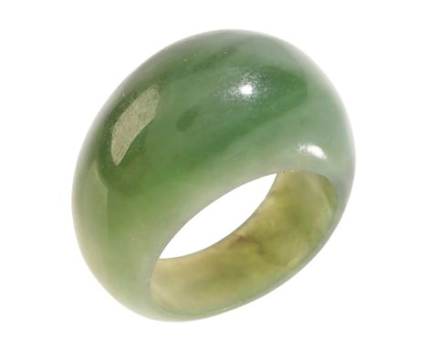 A NEPHRITE JADE RINGcarved in a bombé design, size N / 54, (c.8.9g)