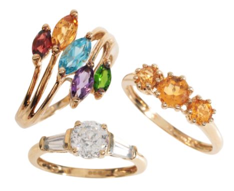 THREE GEM-SET RINGSin 9ct gold, including a gem-set dress ring, set with marquise cut garnet, citrine, topaz, amethyst and pe