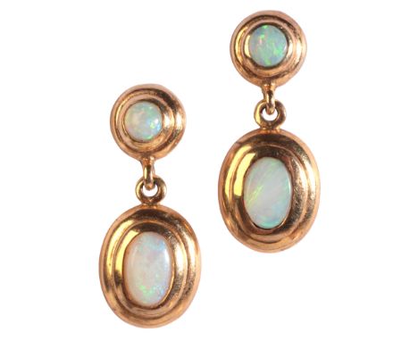 A PAIR OF OPAL DROP EARRINGSin 9ct gold, each comprising a stylised stud set with a round opal cabochon, articulated to a dro