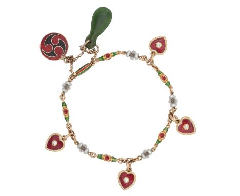 AN ANTIQUE ENAMELLED DIAMOND BRACELET in 15ct gold, comprising a series of fancy links, decorated with red and green enamel a