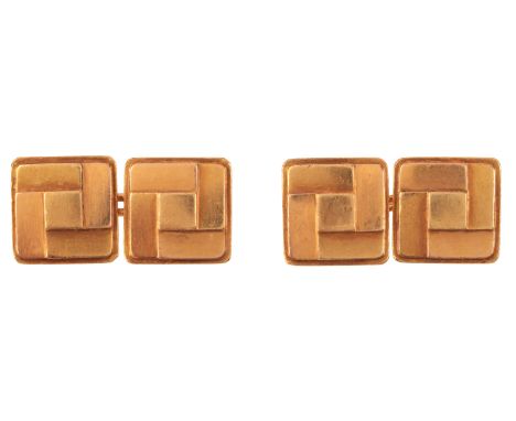 CARTIER: A PAIR OF VINTAGE STYLISED SQUARE CUFFLINKSin 18ct gold, each terminal in a stylised geometric design, signed 'Carti