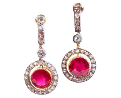 A PAIR OF VINTAGE SYNTHETIC RUBY AND DIAMOND DROP EARRINGSin silver on gold, each comprising row of rose cut diamonds, suspen