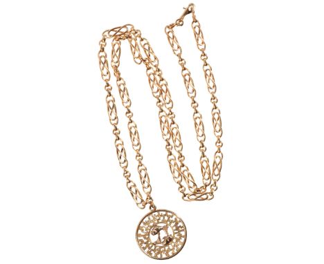 A VINTAGE ZODIAC PENDANT NECKLACEin 18ct gold, comprising a series of fancy links, suspending a Pisces medallion pendant in 9