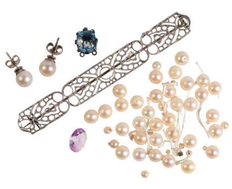 A COLLECTION OF JEWELS AND SPARESincluding a pair of pearl stud earrings; together with a collection of drilled pearls; a syn