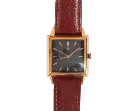 OMEGA: A GENTLEMAN'S GOLD-PLATED WRISTWATCHwith automatic movement, the black dial with gold baton numerals and gold hands, c