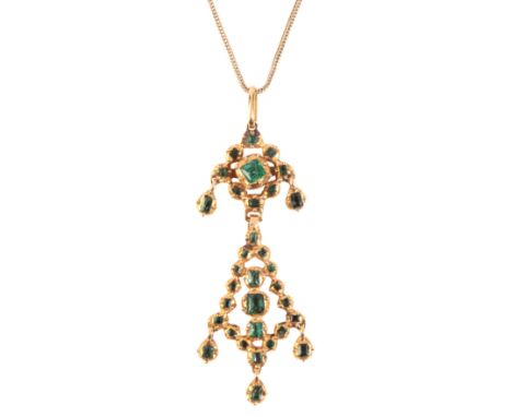 AN EMERALD PENDANT NECKLACEin 18ct gold, set throughout with step cut emeralds over an articulated design, terminated by emer