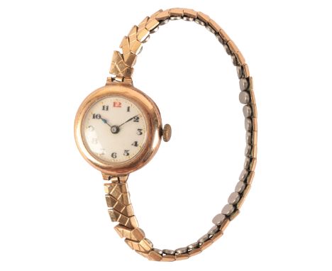 A LADY'S 9CT GOLD WRISTWATCHwith manual wind movement, the white enamel dial with black Arabic numerals and dark blue steel h