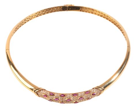 A RUBY AND DIAMOND COLLAR NECKLACEin 18ct gold, set with marquise cut rubies and pavé-set with round brilliant cut diamonds, 