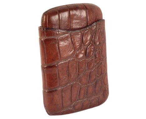 AN EDWARDIAN MID-BROWN CROCODILE SKIN CIGAR CASEcirca 1940's, to hold approximately six cigars, 14cm x 10cm