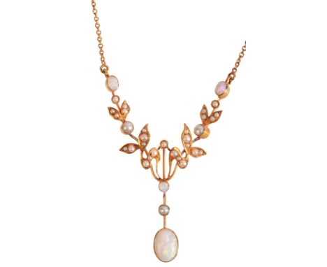 AN ANTIQUE EDWARDIAN OPAL AND PEARL PENDANT NECKLACEin 15ct gold, comprising a stylised floral pendant, set throughout with s