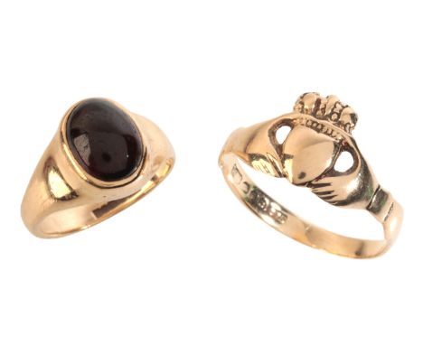 A GARNET SIGNET RINGin 9ct gold, set with a garnet cabochon, full British hallmarks, size F / 44; together with a claddagh ri