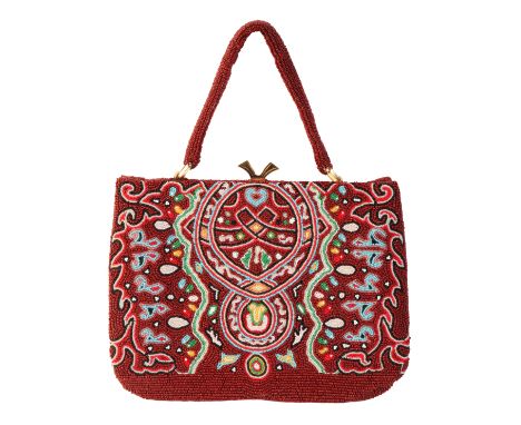 A VINTAGE BEADED CLUTCH HANDBAGwith intricate beadwork design, purse clasp fastening and beadwork handle