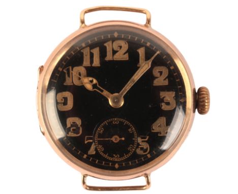 A GENTLEMAN'S 9CT GOLD TRENCH WATCHwith manual wind movement, the black dial with gold Arabic numerals and gold luminous hand