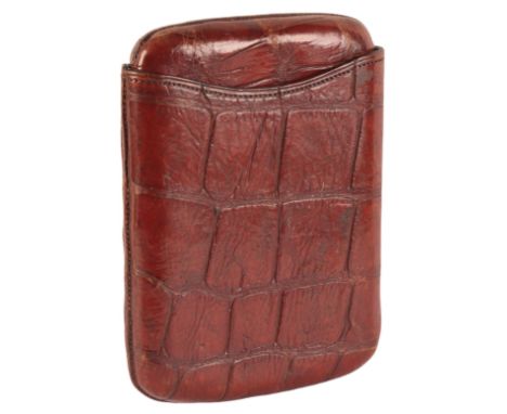 AN EDWARDIAN MID-BROWN CROCODILE SKIN CIGAR CASEcirca 1940's, to hold approximately six cigars, 15cm x 10cm