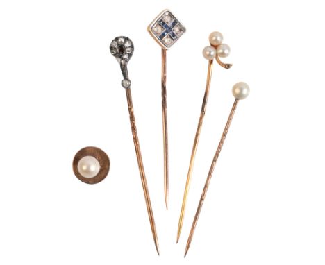 A COLLECTION OF STICK PINSincluding a sapphire and diamond stick pin, surrounded by a white enamel border; a clover stick pin