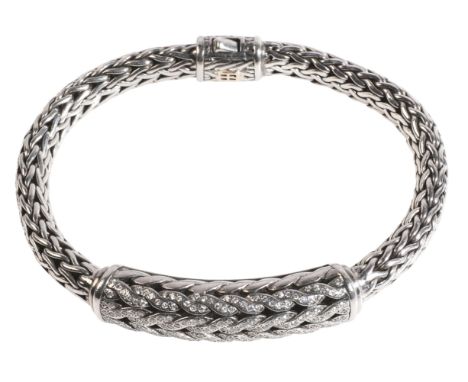 JOHN HARDY: A DIAMOND ICON BRACELETin sterling silver and 18ct white gold, comprising a series of woven links, to a central o