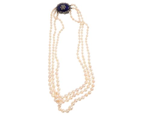 AN ANTIQUE THREE ROW PEARL NECKLACEcomprising three rows of cultured pearls, secured with a tongue and groove clasp, set with