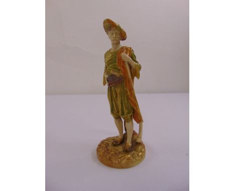 Royal Worcester blush ivory figurine of a gentleman in fancy costume on naturalistic base