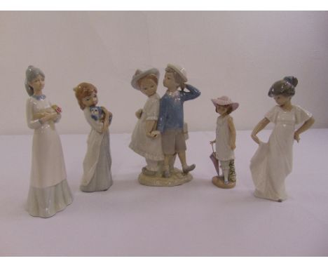 A quantity of Lladro and Nao figurines of young boys and girls (5)